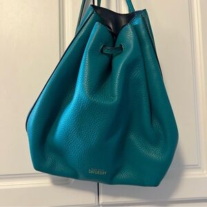 Kate Spade teal leather bucket bag with drawstring closure